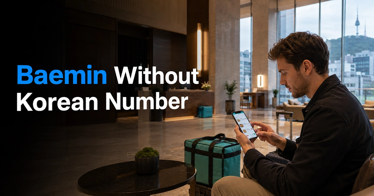 Traveler waiting for food delivery with a smartphone in a Seoul hotel lobby