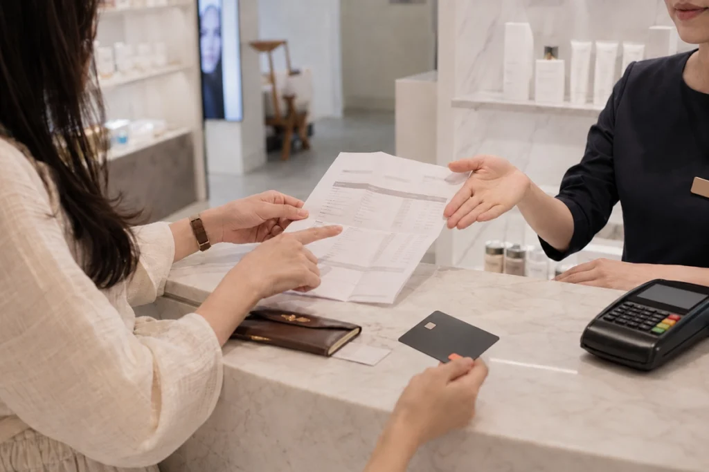 Traveler at a Seoul cosmetic clinic with Korea cosmetic VAT refund 2026 ended message